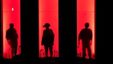 World War One soldiers projected on to the clocktower in the Square.