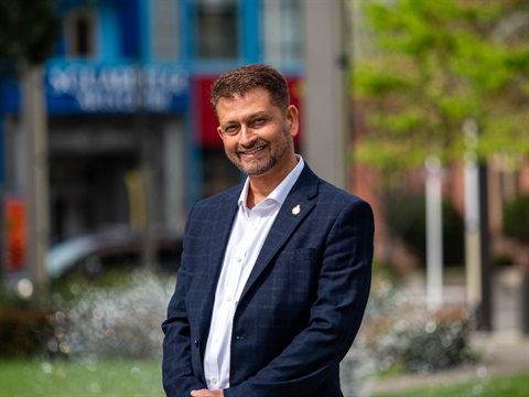 photo of a man standing on the square