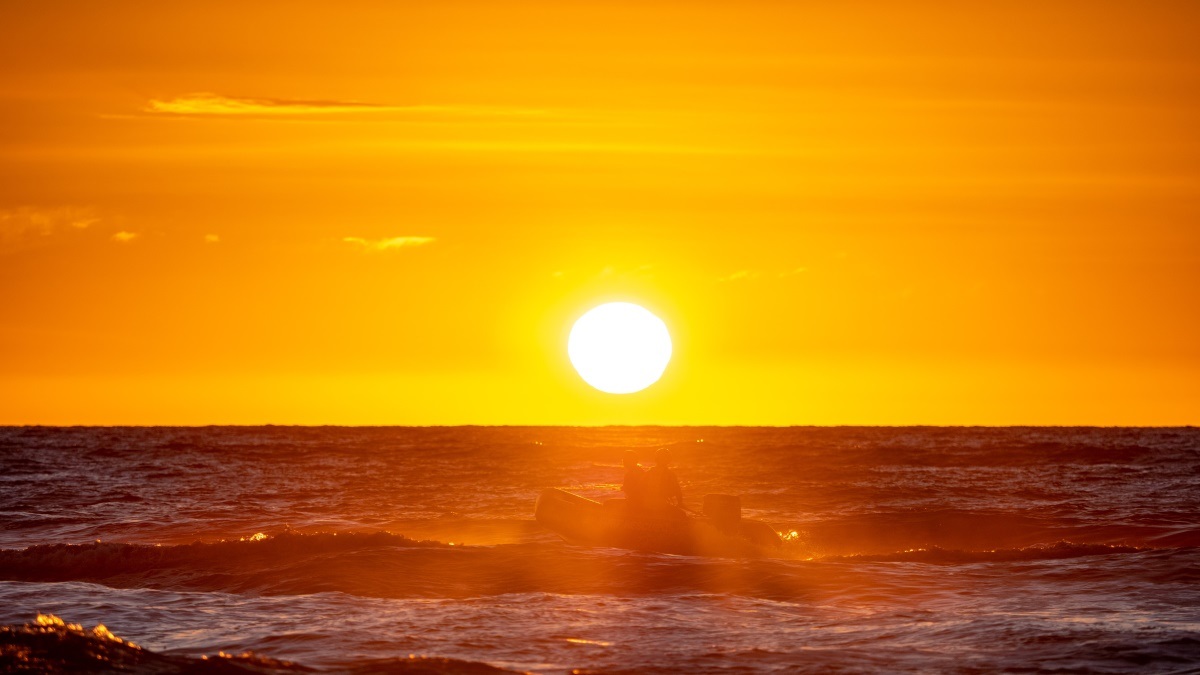 Gorgeous sunset over the sea at Himitangi Beach.