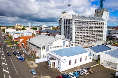 Image shows aerial view of buildings in city centre area