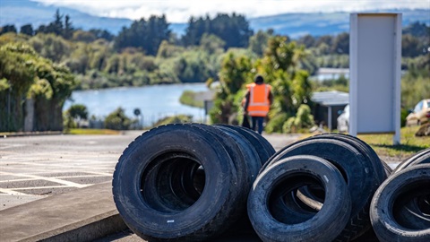 Neatly stacked tyres that have been dropped off to be recycled.