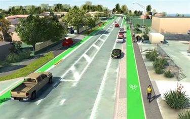 This is how the cycleway will look outside Coffee in a Box/Uku Designs/Landscape Yard, the cycleway will be moved to the berm behind parked cars.